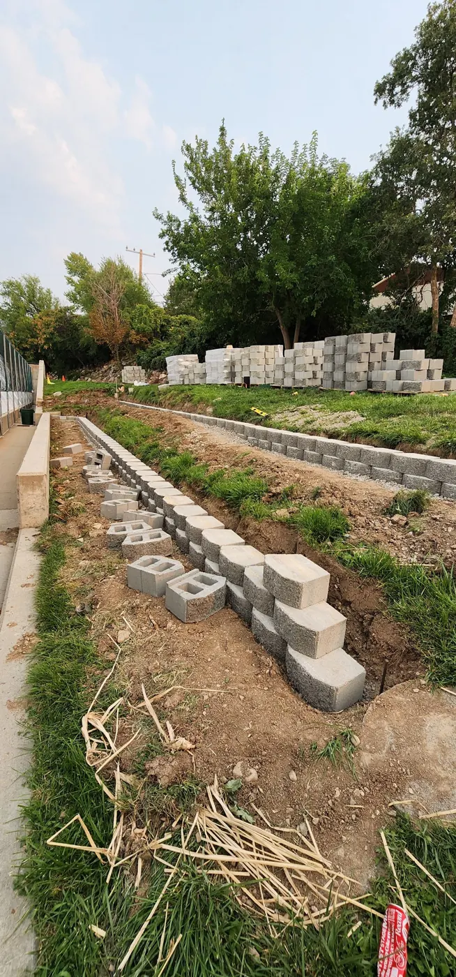 Before: Slope to terraced retaining walls